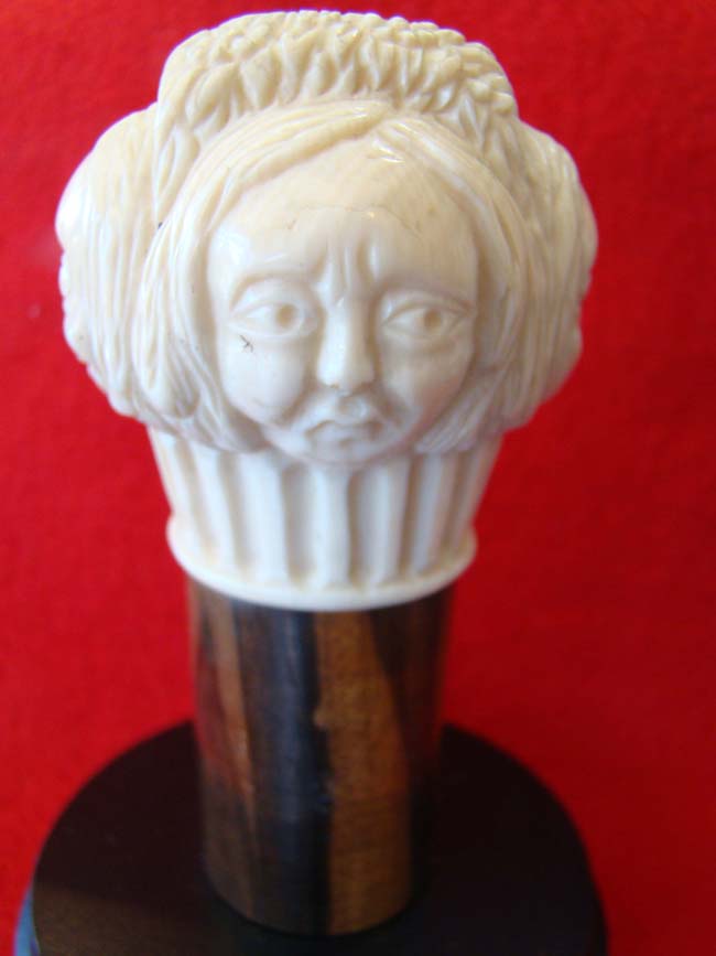 A rare carved four sided ivory knob from a cane with each side depicting the face of a woman with a different expressions. American circa 1850-1875 — image 2